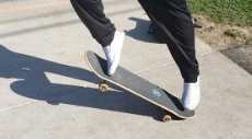 Jordan Guerrero about to do a kickflip.