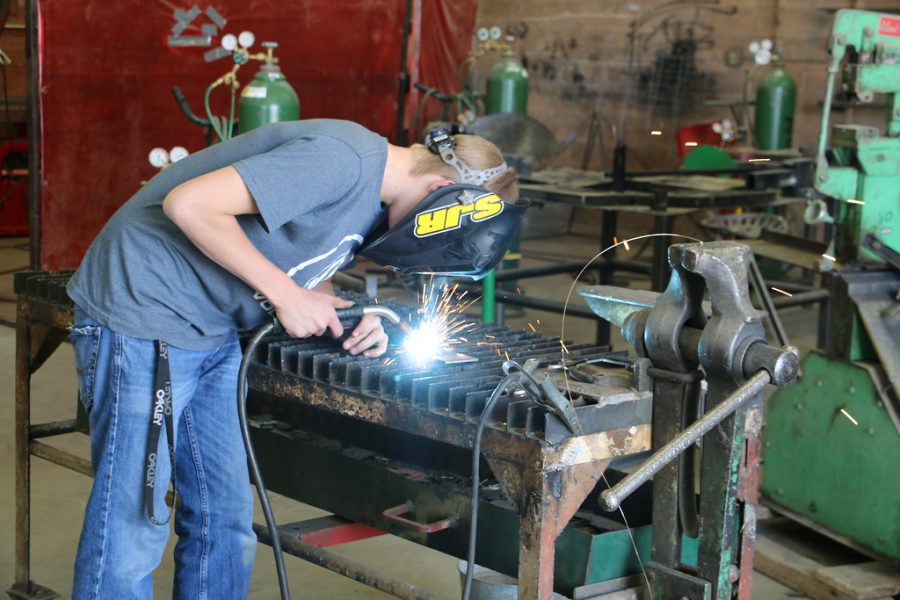 Student working on a project in an industrial class. 