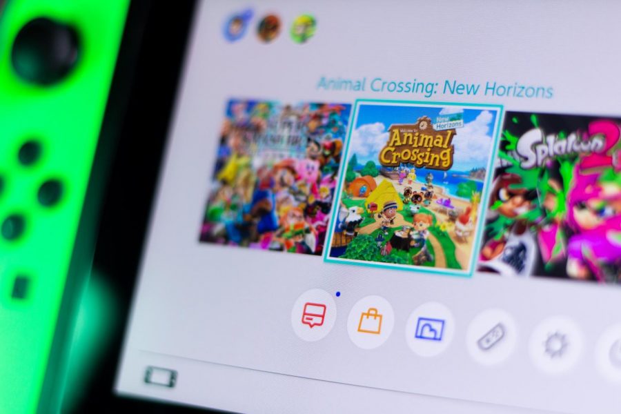 Nintendo+Switch+home+screen+displaying+Animal+Crossing%3A+New+Horizons+with+two+other+games.