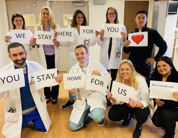 Hospital staff encourages people to stay home and stay safe.
