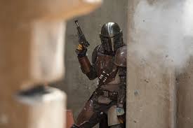 The Mandalorian, poised for action, during one of the episodes.