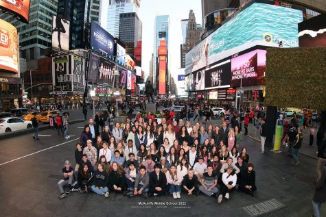A group photo at Time Square of the 2021-22 students that went on the DC/NYC trip.
